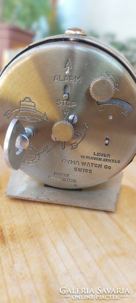 Swiss travel watch with amic syma precise mechanism
