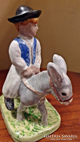 Izsépy ceramic, a boy on a donkey, on a donkey's back, with a dog, flawless, foal boy figure.