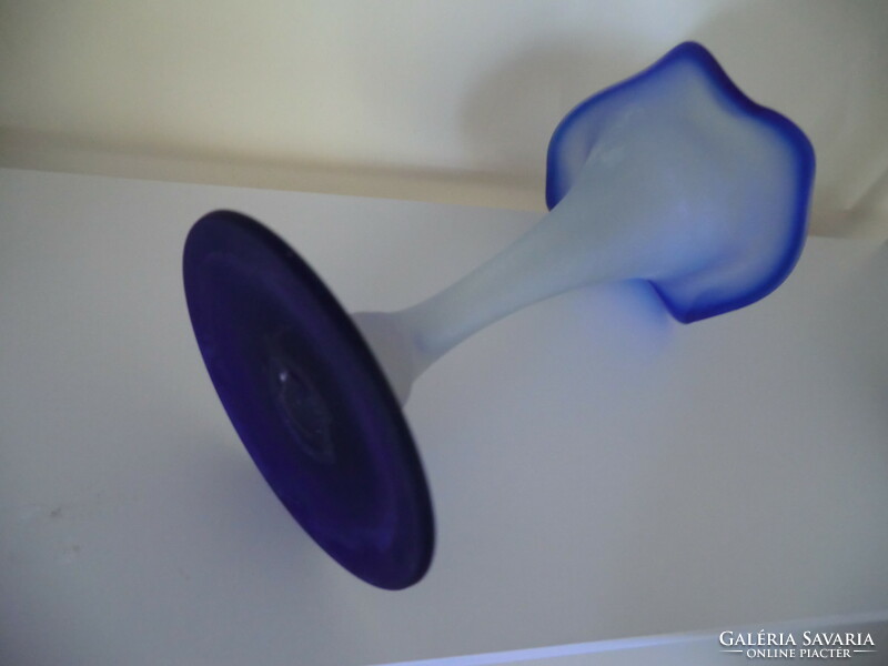 A blue glass vase with a wavy edge and a floating mouth with a diameter of 14 cm and a height of 24 cm