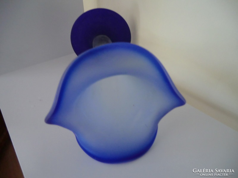 A blue glass vase with a wavy edge and a floating mouth with a diameter of 14 cm and a height of 24 cm