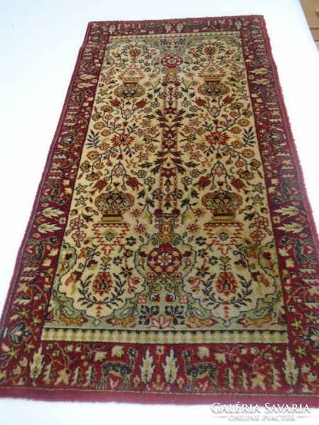 A luxury rug made of virgin wool with a beautiful animal motif