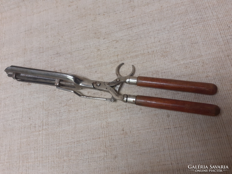 Antique marked drgm curling iron