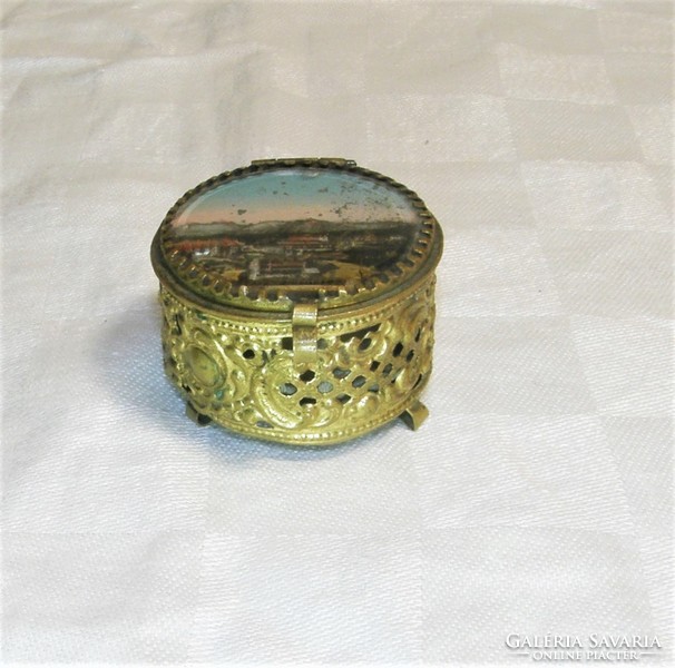 Antique openwork copper jewelry holder with painted glass top.