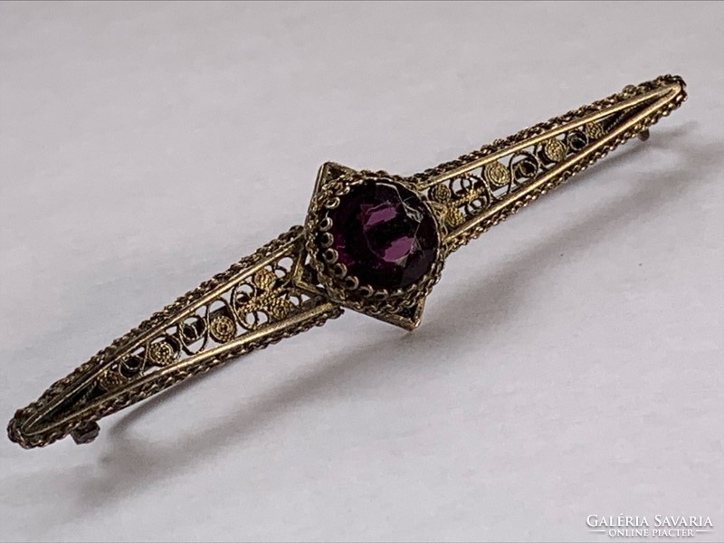 Antique silver-plated copper brooch with purple stone