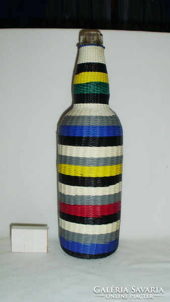 Retro glass bottle tied with colored wire