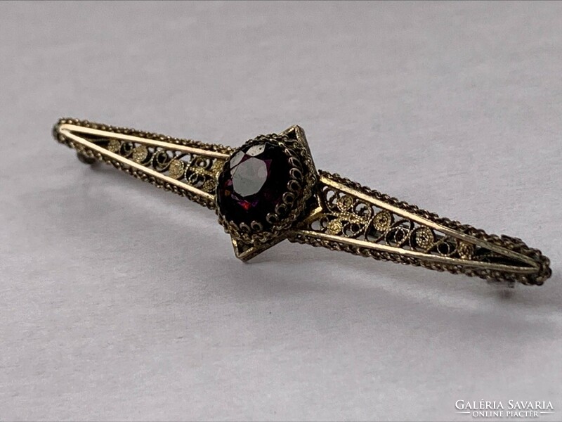 Antique silver-plated copper brooch with purple stone