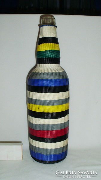 Retro glass bottle tied with colored wire