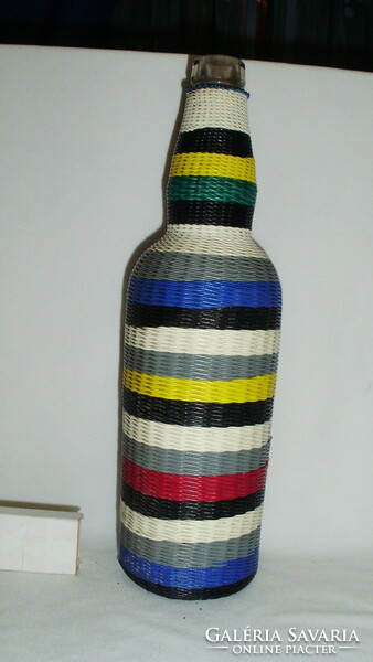 Retro glass bottle tied with colored wire