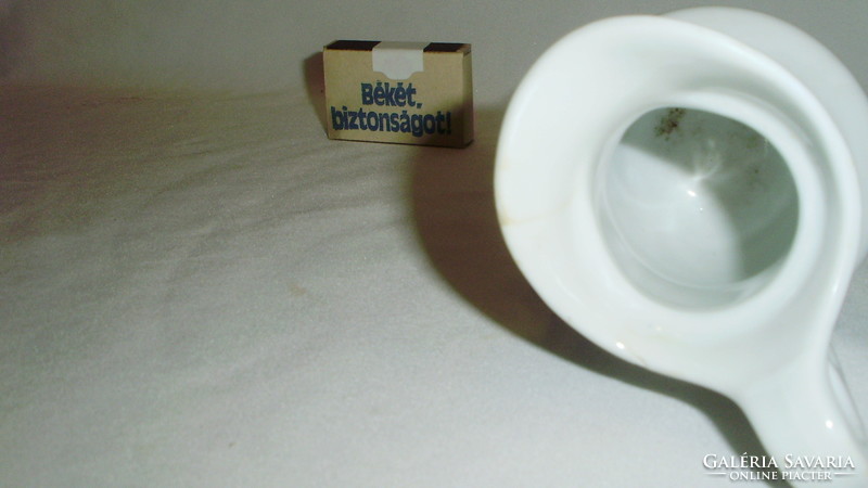 Antique, thick-walled porcelain milk spout, small jug