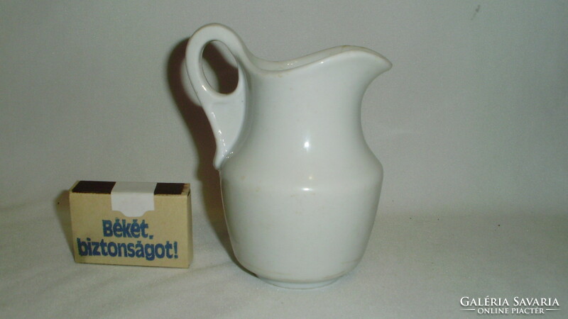 Antique, thick-walled porcelain milk spout, small jug
