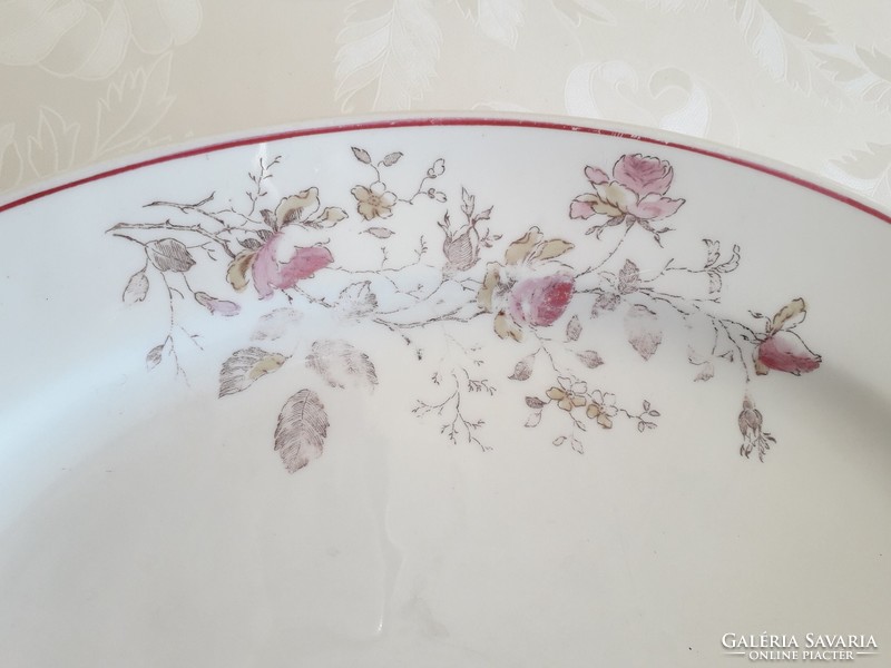 Old floral thick-walled porcelain steak bowl with rosy folk commas