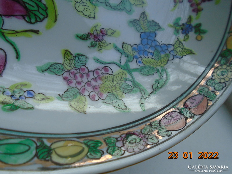 Antique hand-painted famille rose Chinese wall plate, fruit and flower on gold background with border pattern