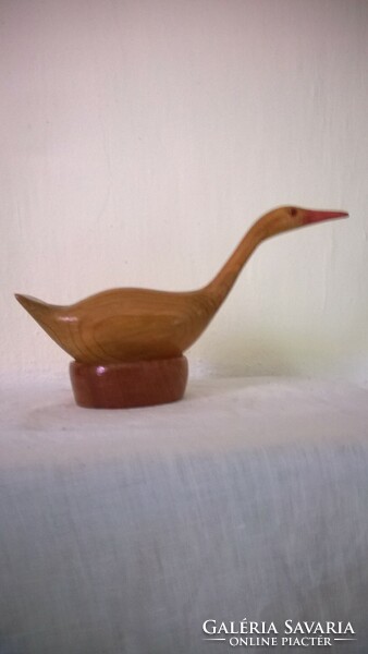 Poet wild goose v. Other bird, wooden, on rotating nest 20x11 cm