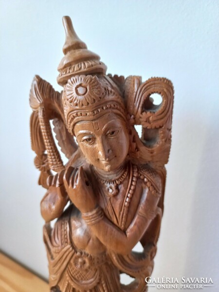 Beautiful krishna hand carved wooden statue 35x10x7cm