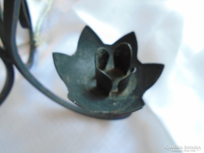 Wrought iron tulip candle holder.