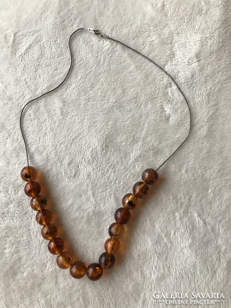Silver necklace with amber beads