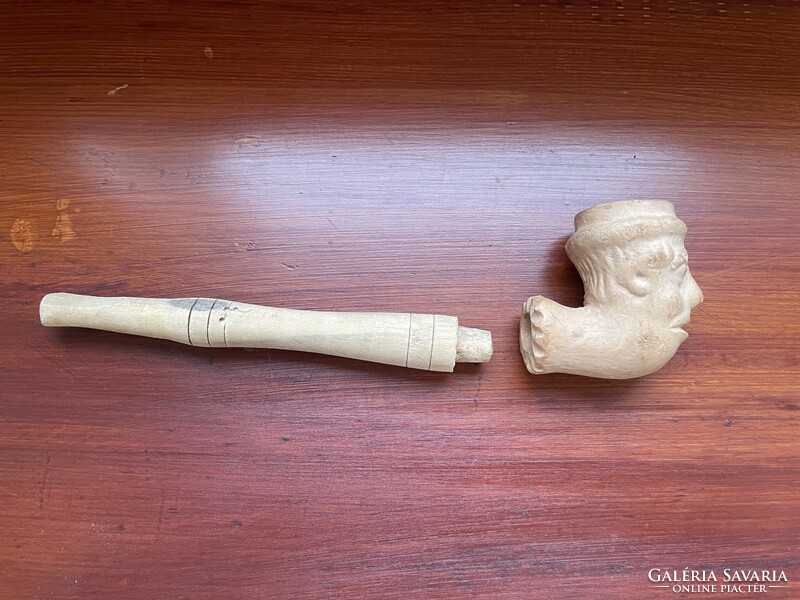 Human-headed pipe with stem