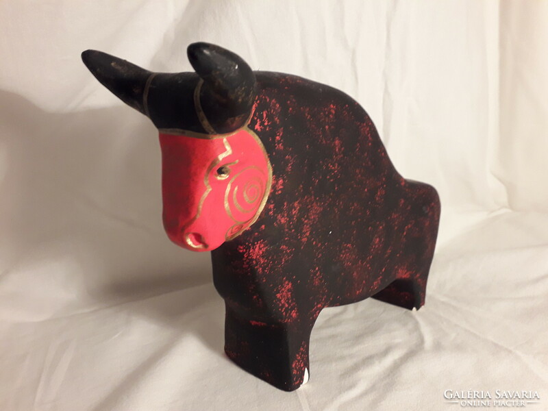 Rot ceramic ceramic bull with a marked paper label, slightly damaged