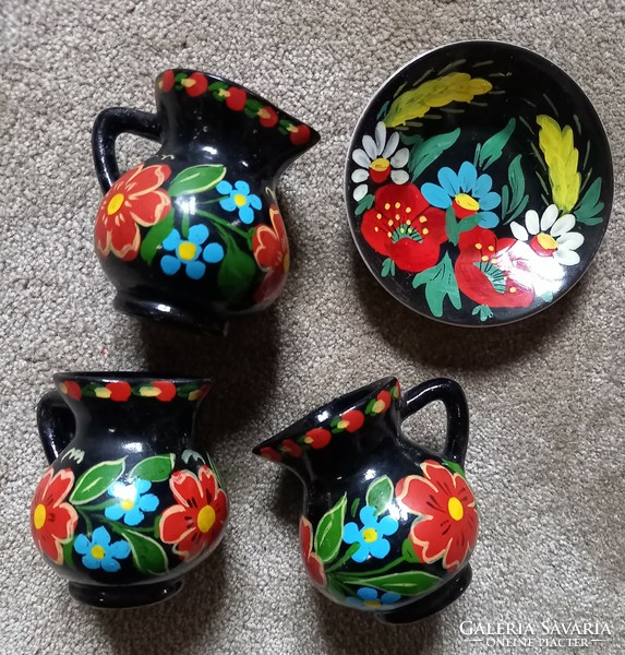 Hand painted black ceramic jugs