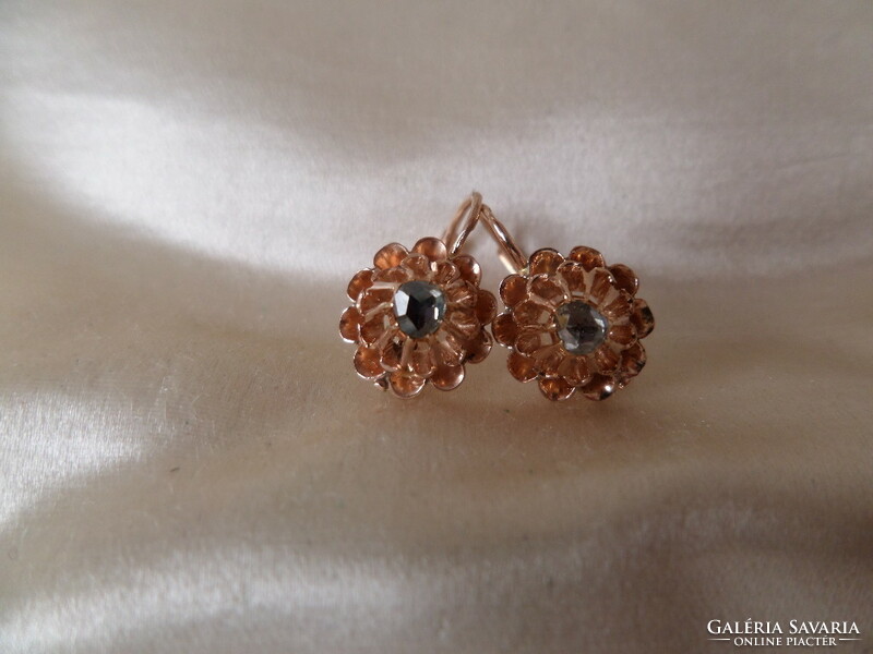 Antique gold earrings with a pair of diamonds