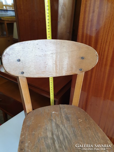 Old retro small wooden chair with vintage highchair