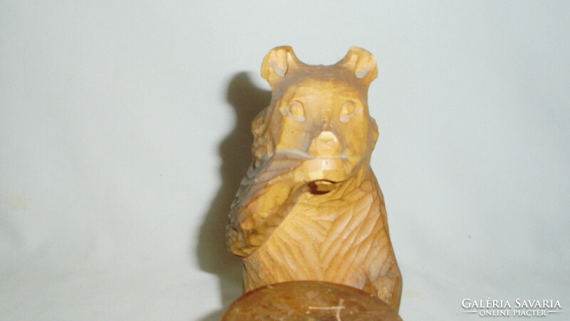 Old Russian carved wooden bear, teddy bear statue on honey pot with small storage