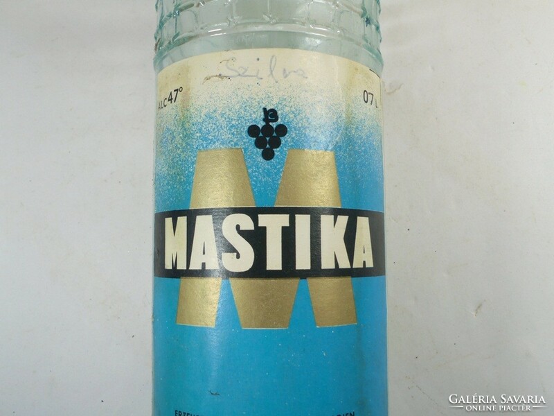 Glass bottle with old paper label - mastika Bulgarian drink - 1980s