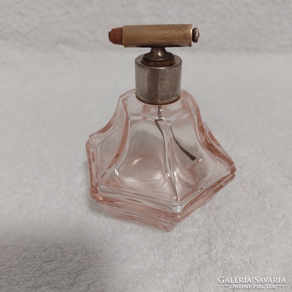 Antique perfume bottle with a beautiful color and shape. Its condition corresponds to its age, the bottle is in perfect condition