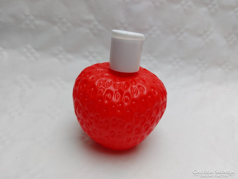 Retro plastic bottle with strawberry strawberry shape