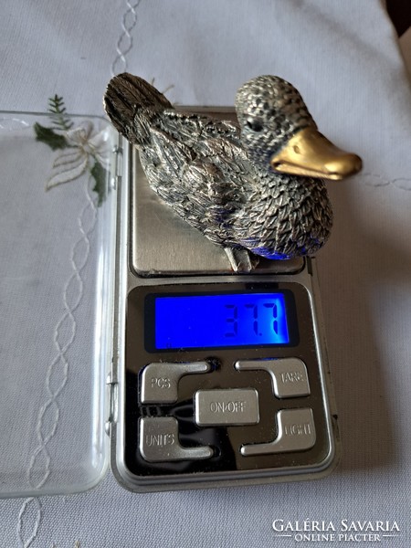 Silver miniature duck figure