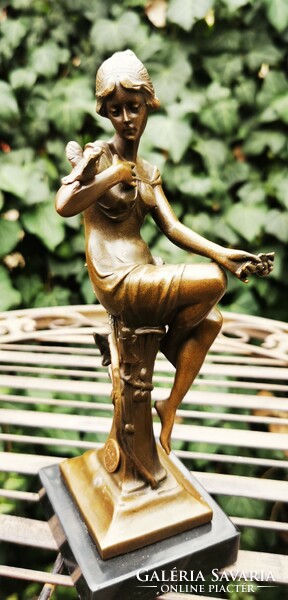 Art Nouveau bronze statue - woman with a bird in her hand