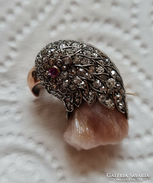 Gold brooch with diamonds and rubies