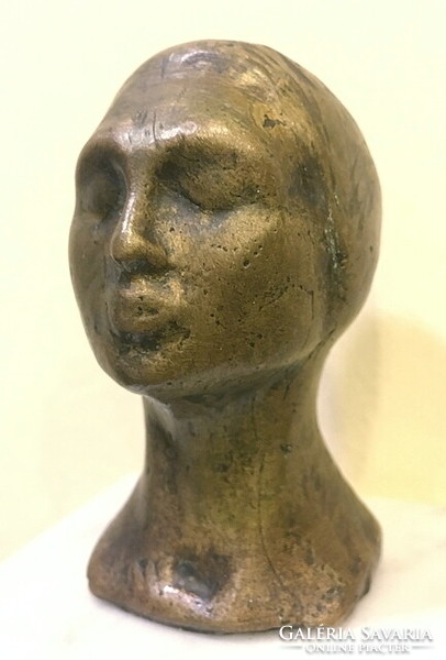 Bronze female head, small size