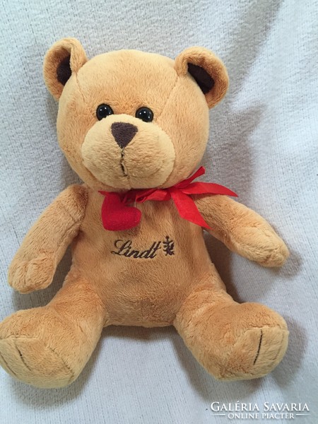 Lindt teddy bear, red bow with heart, opening pocket at the back