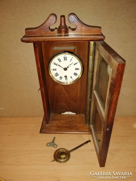 Antique partisan wooden carved glazed pendulum wall clock