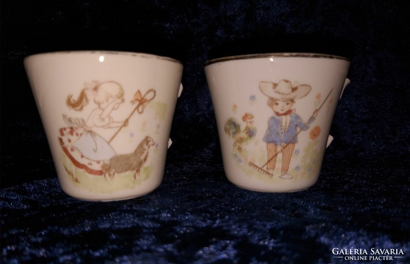 Pair of antique porcelain children's mugs and cups