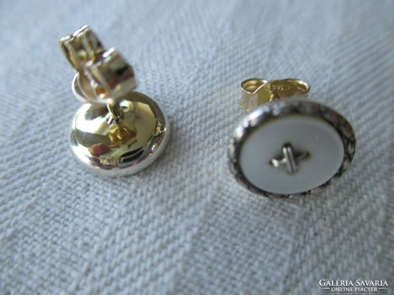 A very charming pair of gold earrings with mother-of-pearl and silver