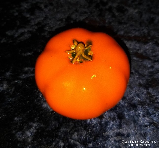 Lifelike ceramic salt shaker in the shape of a tomato