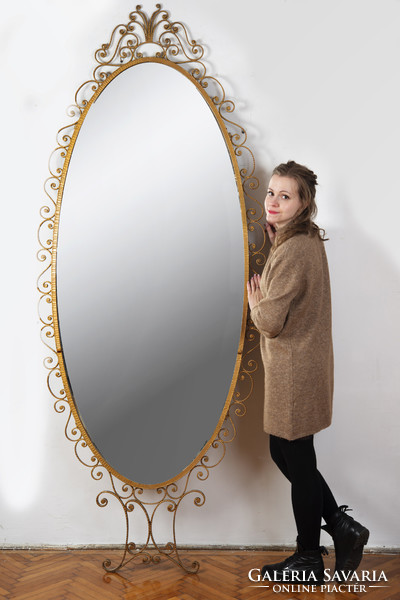 Large standing mirror with a copper frame