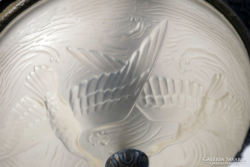 A small ceiling chandelier with a bird's eye