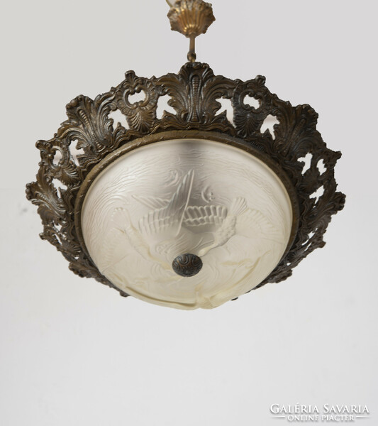 A small ceiling chandelier with a bird's eye