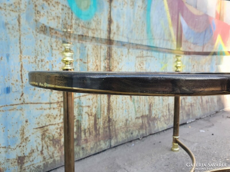 Tubular coffee table with oval glass top