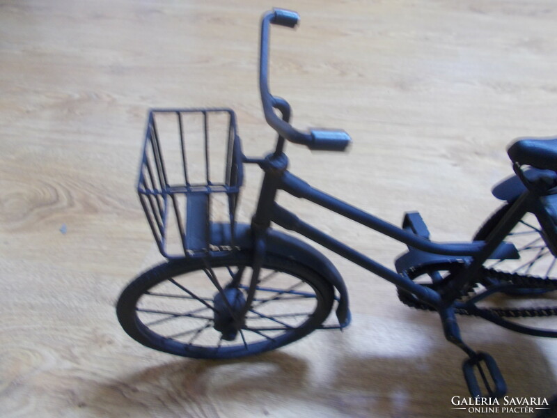 Old antique hand-made three-wheel bicycle in original working condition