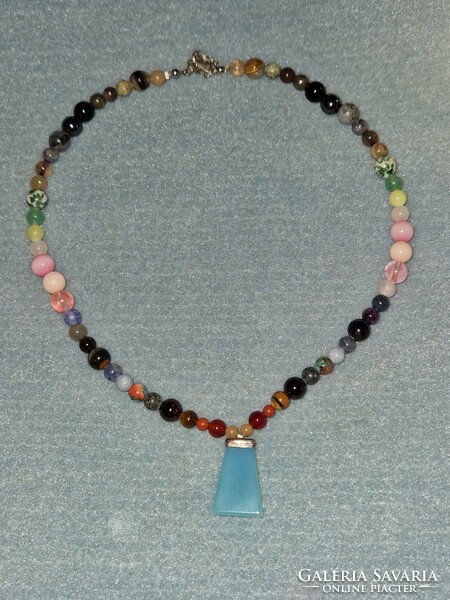Healing chakra necklaces with blue chalcedony pendants and many precious stones