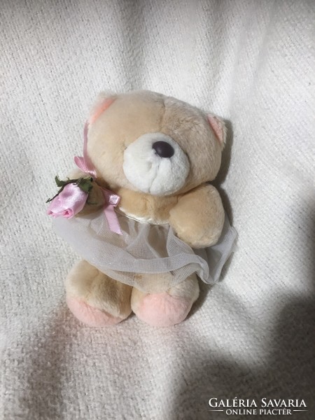 Little bear girl with a rose