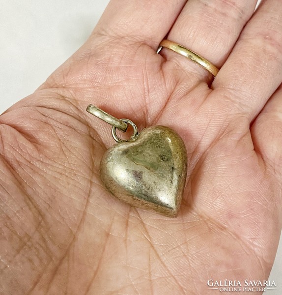 Heart-shaped silver pendant