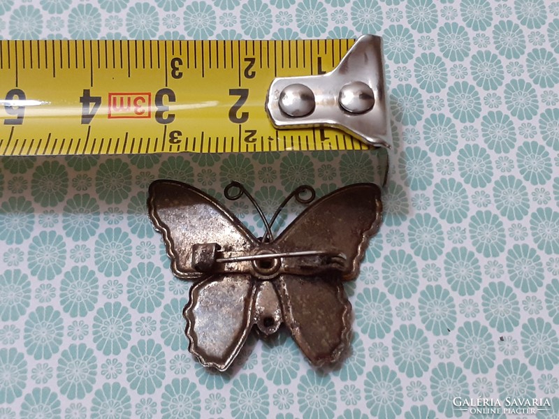 Retro enamel brooch with butterfly shaped badge