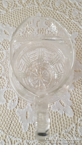 Old, engraved thick crystal water jug