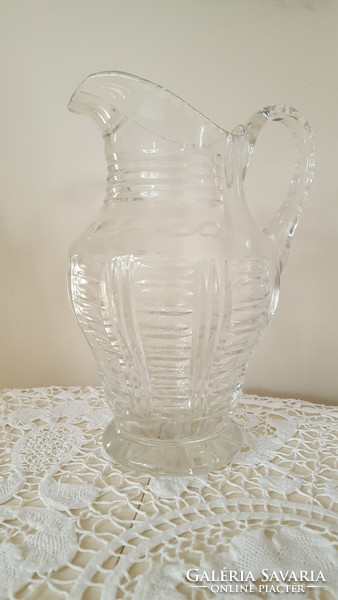 Old, engraved thick crystal water jug