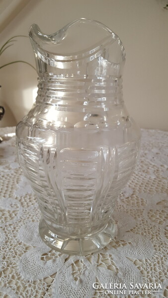 Old, engraved thick crystal water jug